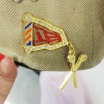 Barber pole cap pin